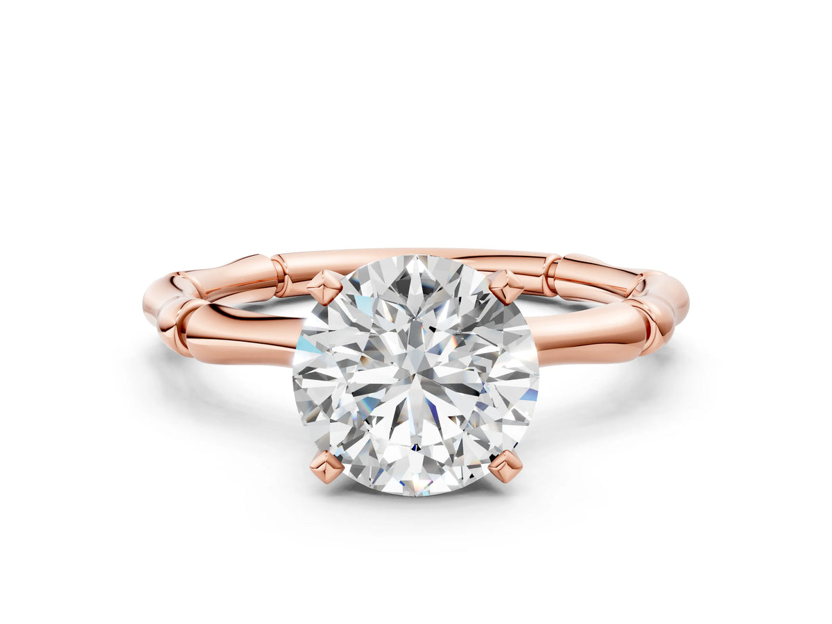 Rose gold Round Cut Solitaire Diamond Ring with Bamboo Band and Four-Prong Setting