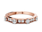 Rose gold Round Diamond Channel Set Eternity Band with Prong Setting