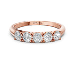 Rose gold Round Diamond Channel Set Half Eternity Band with Shared Prong Setting