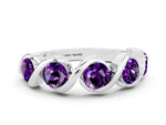 Round Amethyst Wave Band in Silver with Channel Setting and Shared Prongs