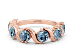 Round Aquamarine Half Eternity Band in Rose gold with Wave Prong Setting