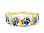 Round Aquamarine Half Eternity Band in Yellow gold with Wave Prong Setting