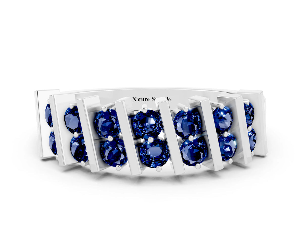Round Blue Sapphire Anniversary Band in White gold with Channel Setting and Vertical Prongs