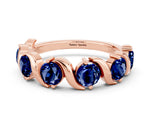 Round Blue Sapphire Half Eternity Band in Rose gold with Wave Prong Setting