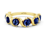 Round Blue Sapphire Half Eternity Band in Yellow gold with Wave Prong Setting