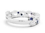 Round Blue Sapphire Leaf Motif Eternity Band in Platinum with Bezel Setting