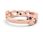Round Blue Sapphire Leaf Motif Eternity Band in Rose gold with Bezel Setting