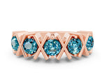 Round Blue Topaz Channel Set Band in Rose gold with X-Prong Detail
