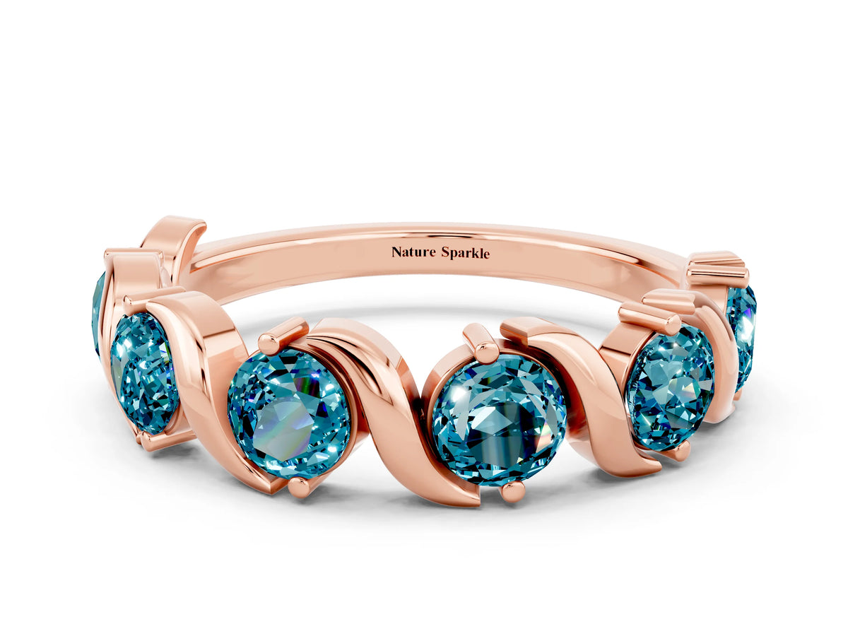 Round Blue Topaz Half Eternity Band in Rose gold with Wave Prong Setting