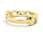 Round Blue Topaz Leaf Motif Eternity Band in Yellow gold with Bezel Setting