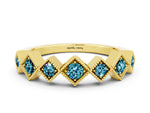 Round Blue Topaz Square Bezel Chevron Band in Yellow gold with Milgrain Detailing