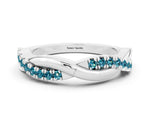 Round Blue Topaz Twisted Infinity Band in Platinum with Prong Setting