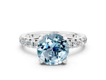 Round Cut Aquamarine Pavé Solitaire Ring in Silver with Round Pavé Band and Prong Setting