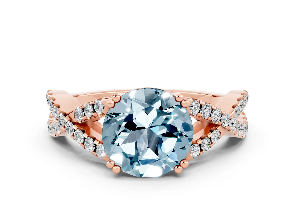 Round Cut Aquamarine Solitaire Ring in Rose gold with Interwoven Pavé Band and Prong Setting