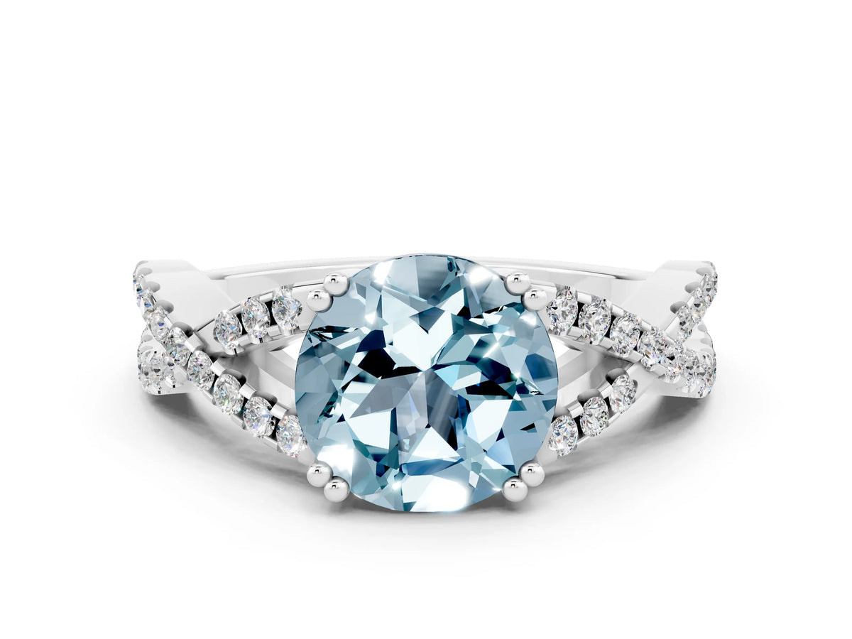 Round Cut Aquamarine Solitaire Ring in White gold with Interwoven Pavé Band and Prong Setting