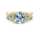 Round Cut Aquamarine Solitaire Ring in Yellow gold with Interwoven Pavé Band and Prong Setting