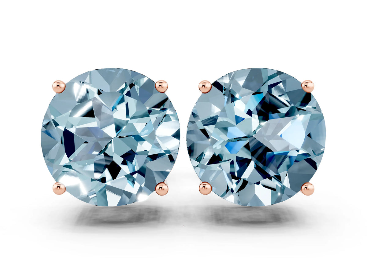 Round Cut Aquamarine Stud Earrings in Rose gold with Basket Setting
