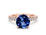 Round Cut Blue Sapphire Pavé Solitaire Ring in Rose gold with Round Pavé Band and Prong Setting