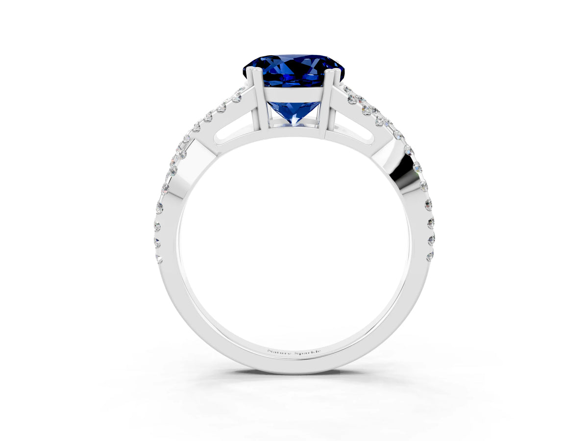 Round Cut Blue Sapphire Solitaire Ring in Platinum with Interwoven Pavé Band and Prong Setting_9