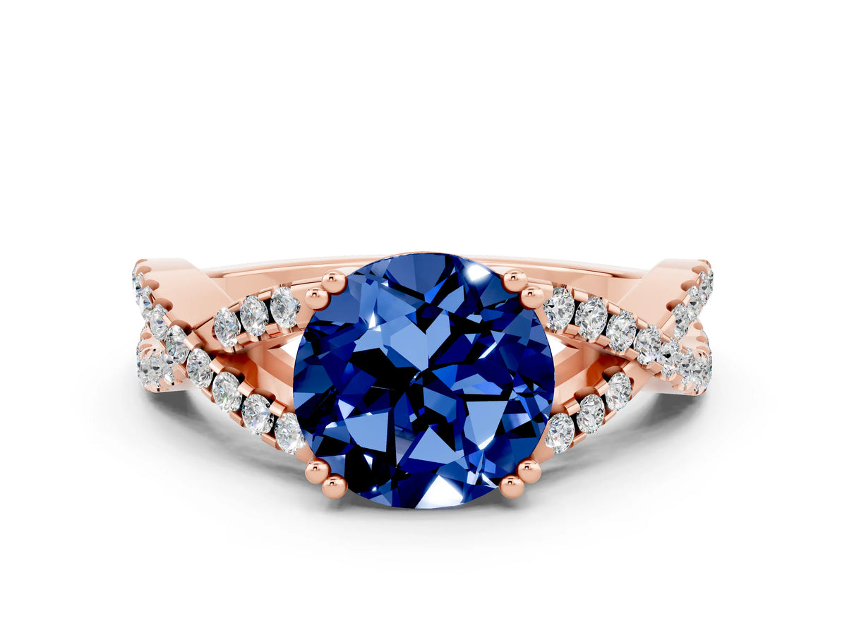 Round Cut Blue Sapphire Solitaire Ring in Rose gold with Interwoven Pavé Band and Prong Setting