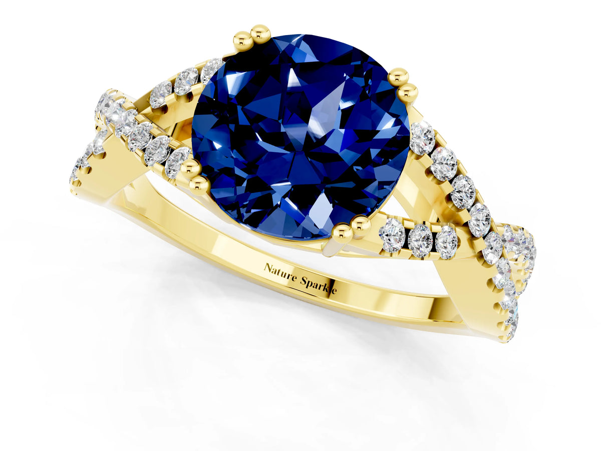 Round Cut Blue Sapphire Solitaire Ring in Yellow gold with Interwoven Pavé Band and Prong Setting_1