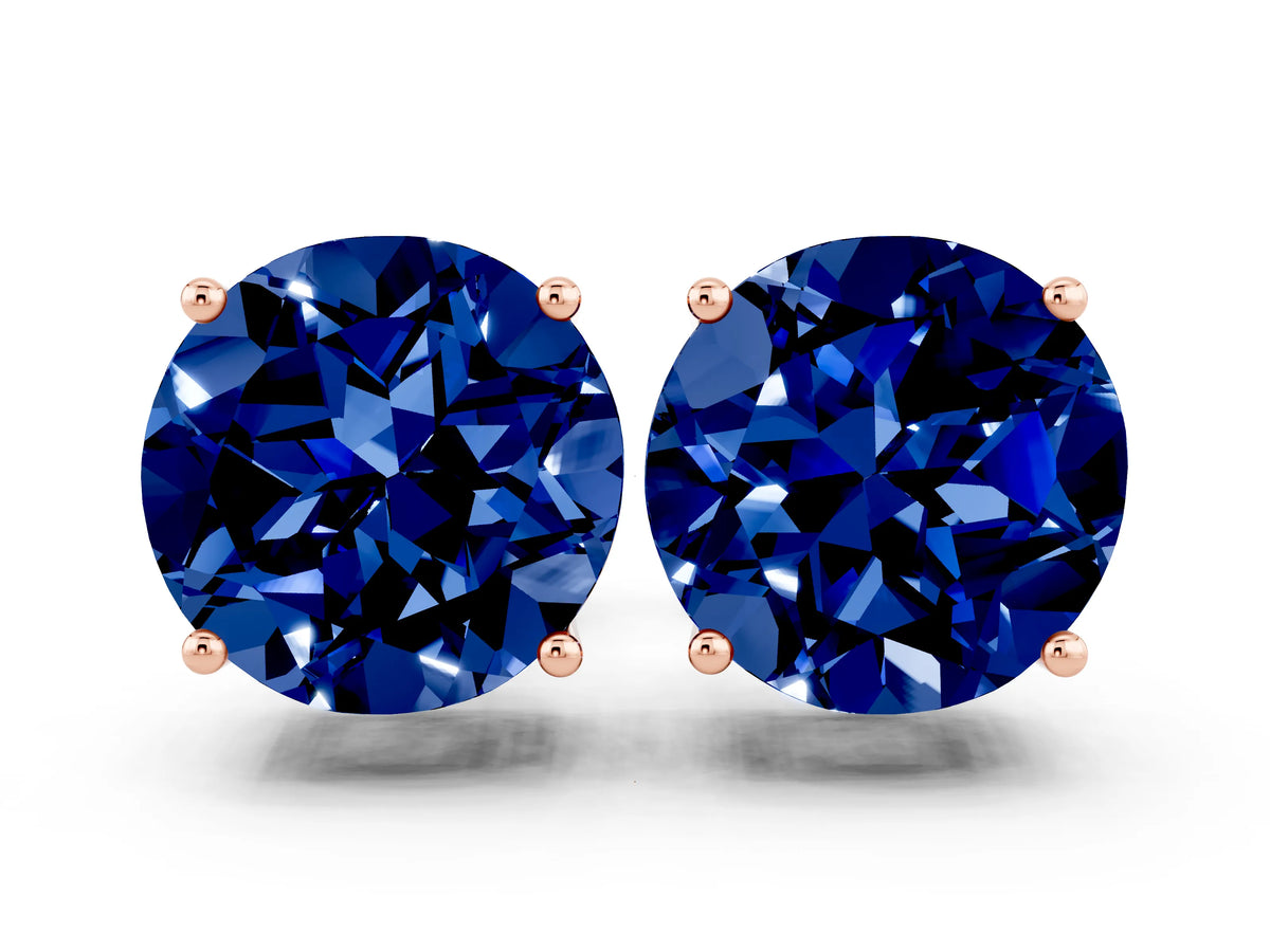 Round Cut Blue Sapphire Stud Earrings in Rose gold with Basket Setting