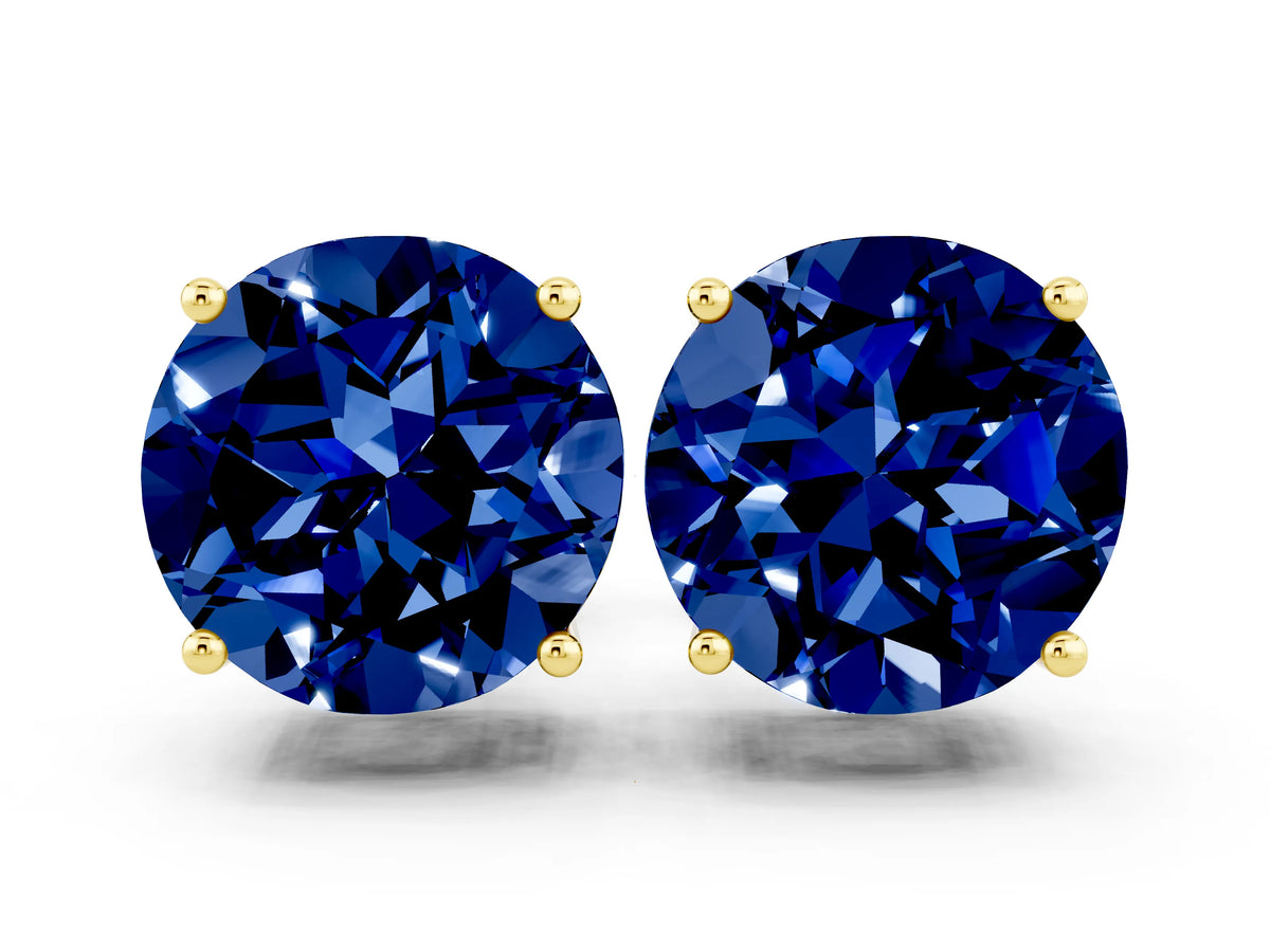 Round Cut Blue Sapphire Stud Earrings in Yellow gold with Basket Setting