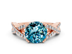 Round Cut Blue Topaz Solitaire Ring in Rose gold with Interwoven Pavé Band and Prong Setting