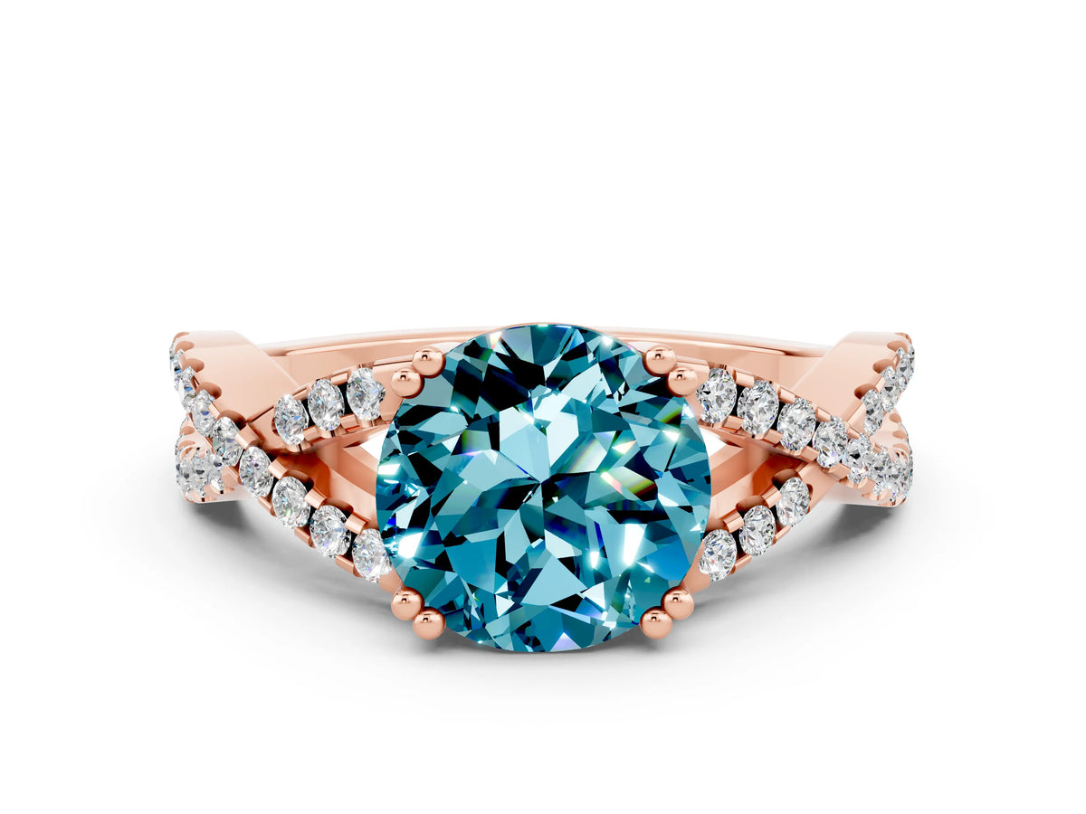 Round Cut Blue Topaz Solitaire Ring in Rose gold with Interwoven Pavé Band and Prong Setting