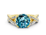 Round Cut Blue Topaz Solitaire Ring in Yellow gold with Interwoven Pavé Band and Prong Setting