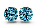 Round Cut Blue Topaz Stud Earrings in Rose gold with Basket Setting