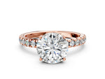 Round Cut Diamond Hidden Halo Engagement Ring in Rose gold with Round Pavé Band