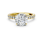 Round Cut Diamond Hidden Halo Engagement Ring in Yellow gold with Round Pavé Band