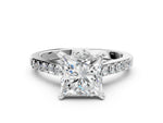 Round Cut Diamond Solitaire Ring in Platinum with Crossover Gallery and Round Pavé Band