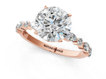 Round Cut Diamond Solitaire Ring in Rose gold with Shared Prong Marquise and Round Side Stones_1