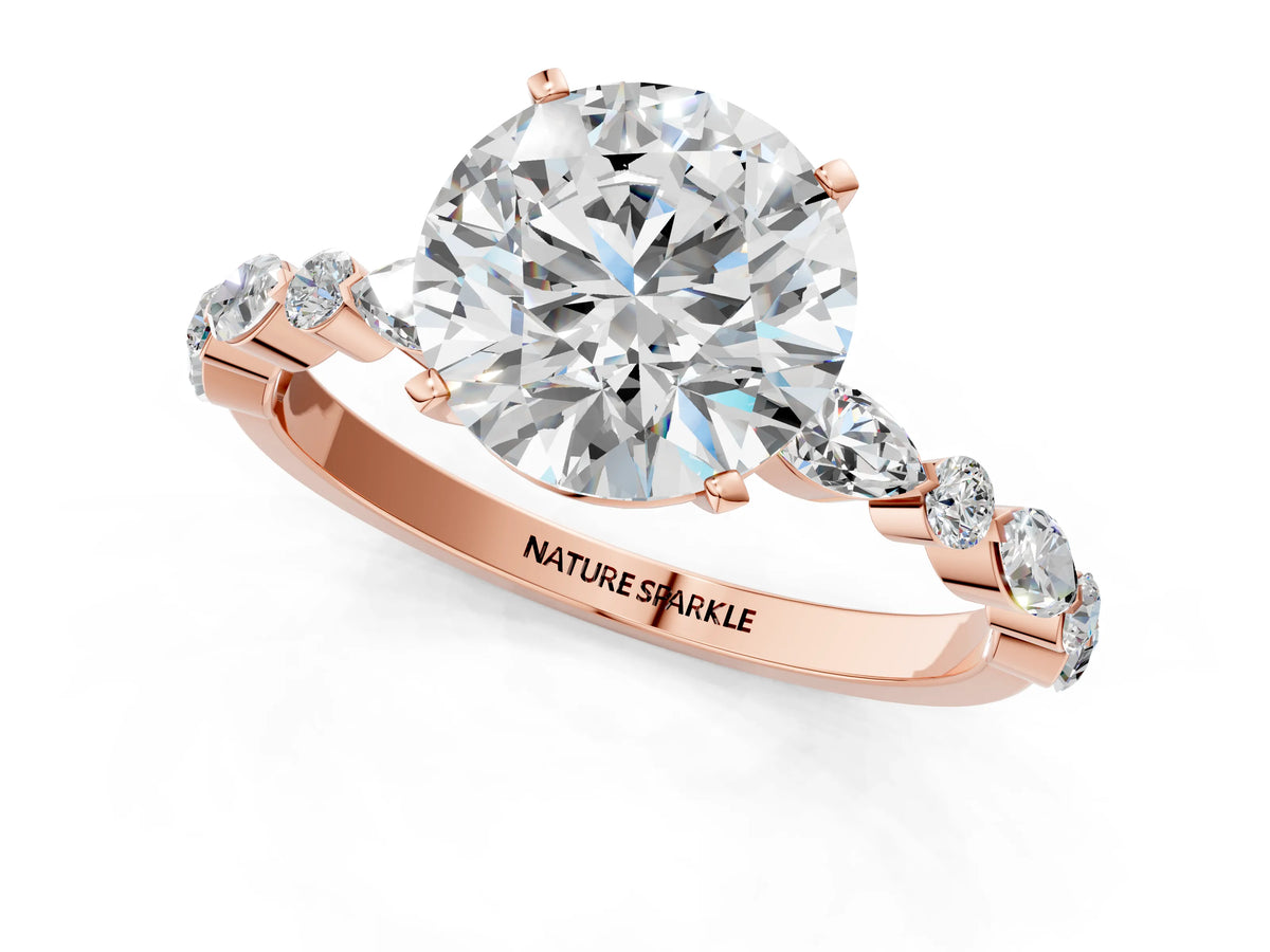 Round Cut Diamond Solitaire Ring in Rose gold with Shared Prong Marquise and Round Side Stones_37