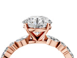 Round Cut Diamond Solitaire Ring in Rose gold with Shared Prong Marquise and Round Side Stones_4
