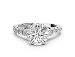 Round Cut Diamond Vintage Scroll Solitaire Ring in White gold with Graduated Round Side Stones