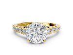 Round Cut Diamond Vintage Scroll Solitaire Ring in Yellow gold with Graduated Round Side Stones
