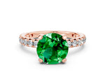 Round Cut Emerald Pavé Solitaire Ring in Rose gold with Round Pavé Band and Prong Setting