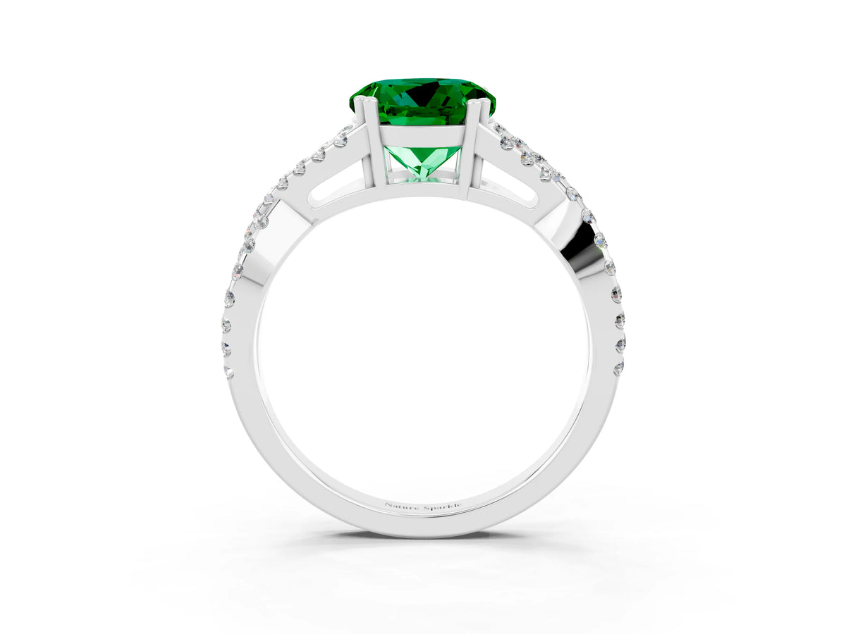 Round Cut Emerald Solitaire Ring in Platinum with Interwoven Pavé Band and Prong Setting_9