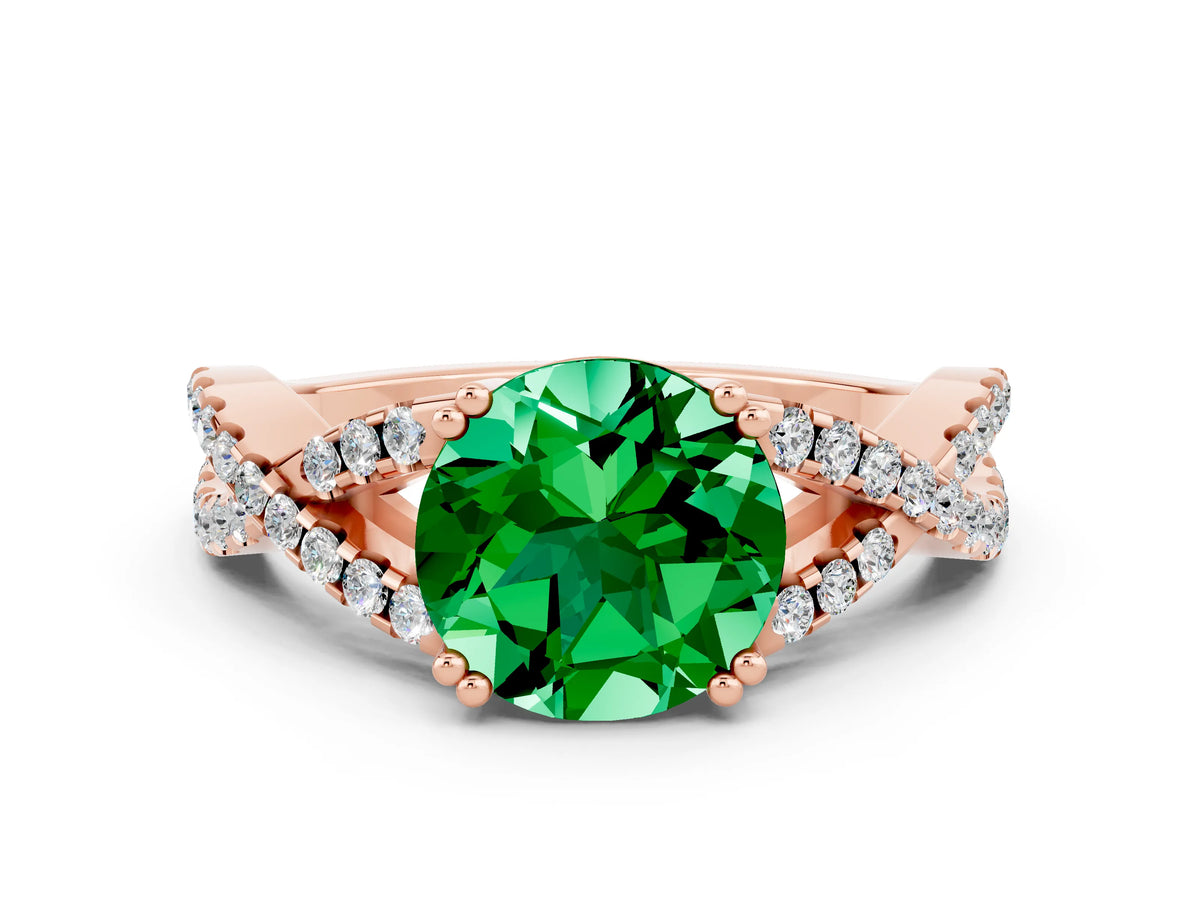 Round Cut Emerald Solitaire Ring in Rose gold with Interwoven Pavé Band and Prong Setting