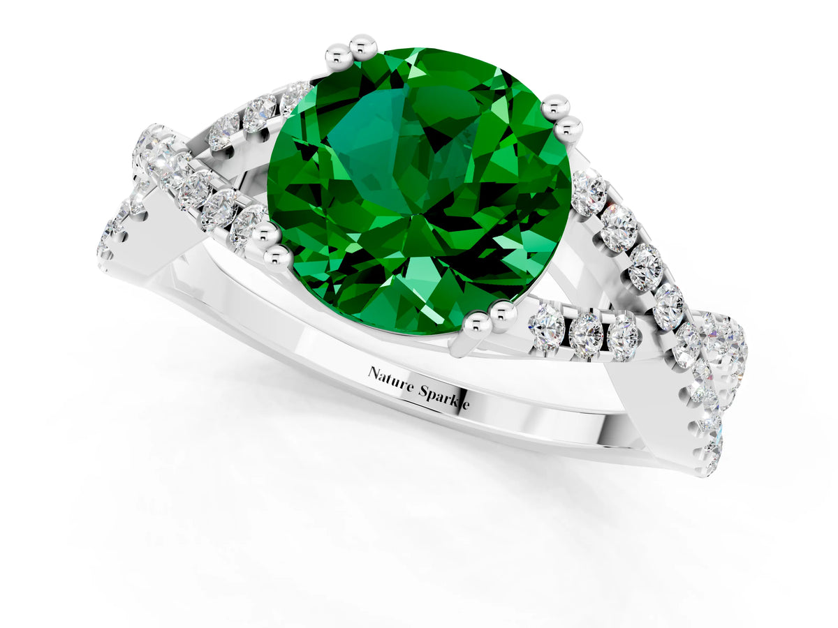 Round Cut Emerald Solitaire Ring in White gold with Interwoven Pavé Band and Prong Setting_1