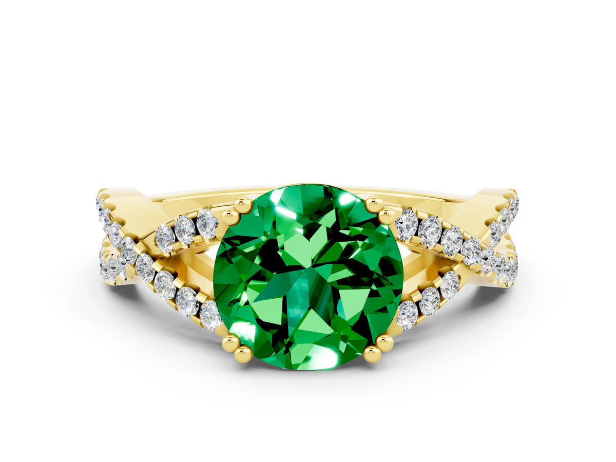Round Cut Emerald Solitaire Ring in Yellow gold with Interwoven Pavé Band and Prong Setting