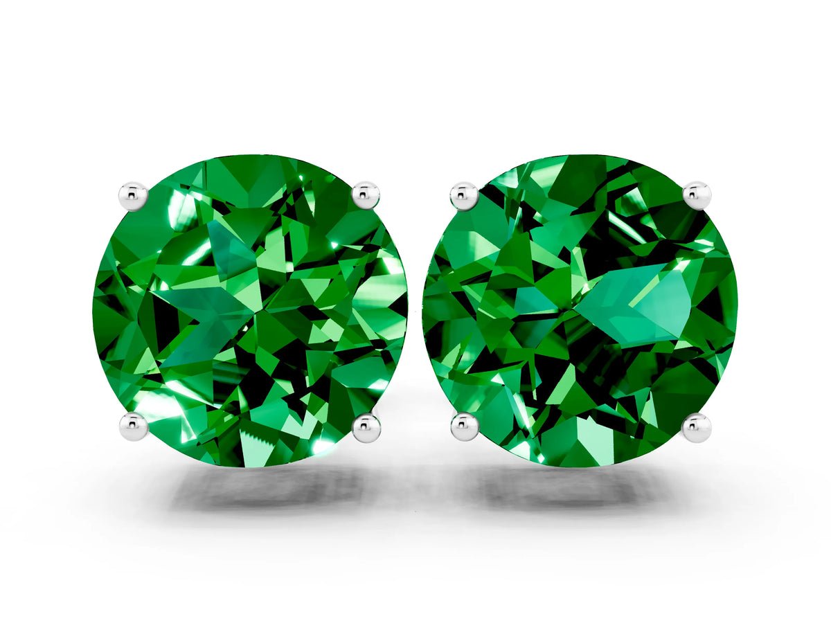Round Cut Emerald Stud Earrings in White gold with Basket Setting