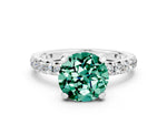 Round Cut Green Sapphire Pavé Solitaire Ring in Silver with Round Pavé Band and Prong Setting