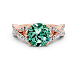 Round Cut Green Sapphire Solitaire Ring in Rose gold with Interwoven Pavé Band and Prong Setting