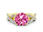 Round Cut Pink Sapphire Solitaire Ring in Yellow gold with Interwoven Pavé Band and Prong Setting
