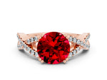 Round Cut Ruby Solitaire Ring in Rose gold with Interwoven Pavé Band and Prong Setting