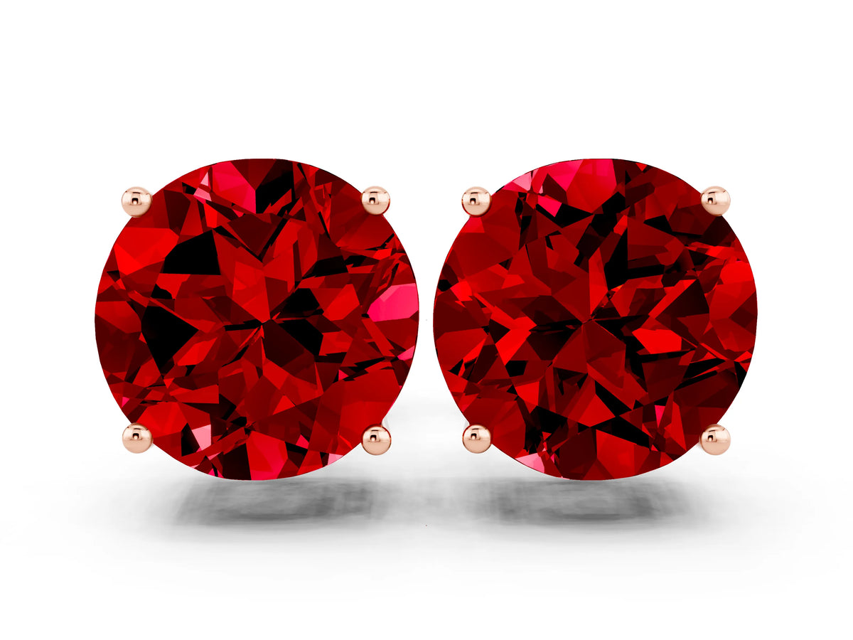 Round Cut Ruby Stud Earrings in Rose gold with Basket Setting